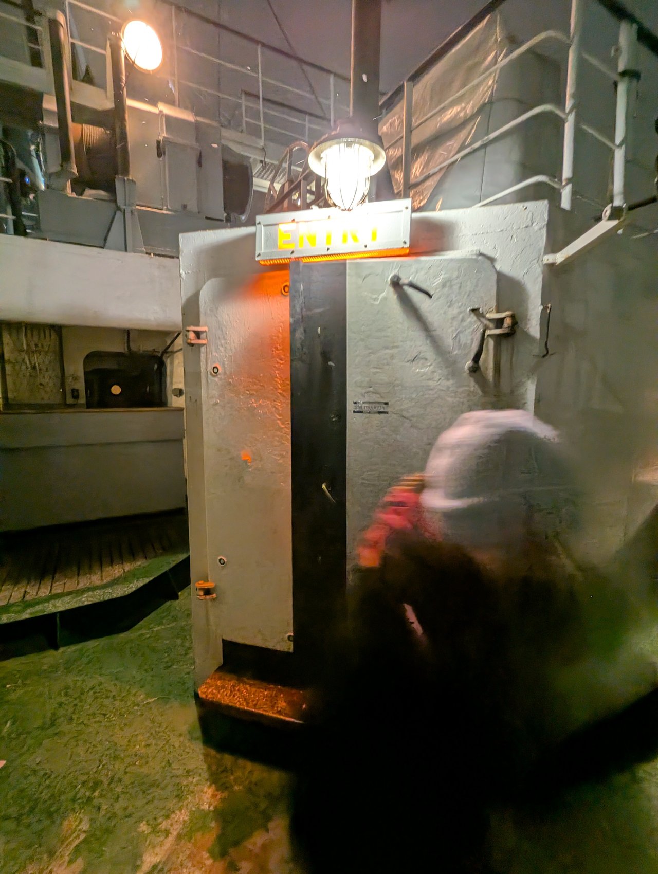 Heavy metal door into the ship. Entrance.